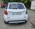 Белый Сузуки СХ4, объемом двигателя 1.59 л и пробегом 100 тыс. км за 4000 $, фото 14 на Automoto.ua