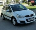 Белый Сузуки СХ4, объемом двигателя 1.6 л и пробегом 125 тыс. км за 9900 $, фото 2 на Automoto.ua