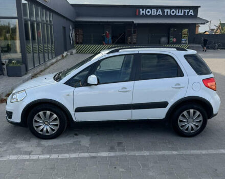 Белый Сузуки СХ4, объемом двигателя 1.59 л и пробегом 134 тыс. км за 9800 $, фото 4 на Automoto.ua