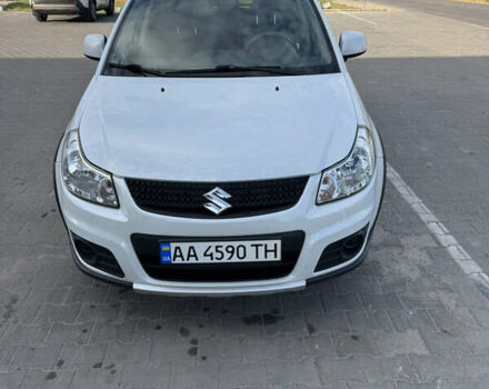 Белый Сузуки СХ4, объемом двигателя 1.59 л и пробегом 134 тыс. км за 9800 $, фото 1 на Automoto.ua