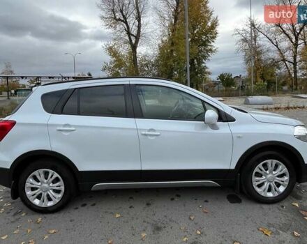 Белый Сузуки СХ4, объемом двигателя 1.59 л и пробегом 103 тыс. км за 18000 $, фото 2 на Automoto.ua