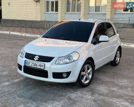 Белый Сузуки СХ4, объемом двигателя 1.59 л и пробегом 124 тыс. км за 8000 $, фото 1 на Automoto.ua