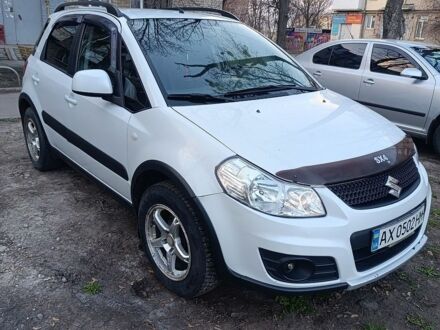 Білий Сузукі СХ4, об'ємом двигуна 1.59 л та пробігом 303 тис. км за 6450 $, фото 1 на Automoto.ua