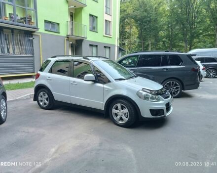 Белый Сузуки СХ4, объемом двигателя 1.6 л и пробегом 125 тыс. км за 9400 $, фото 1 на Automoto.ua