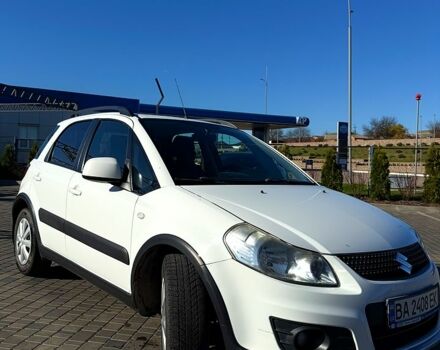 Белый Сузуки СХ4, объемом двигателя 1.6 л и пробегом 125 тыс. км за 9500 $, фото 1 на Automoto.ua