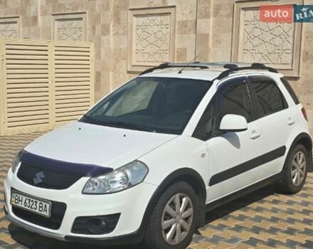 Белый Сузуки СХ4, объемом двигателя 1.6 л и пробегом 102 тыс. км за 9500 $, фото 1 на Automoto.ua