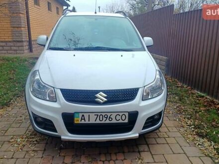 Белый Сузуки СХ4, объемом двигателя 1.6 л и пробегом 98 тыс. км за 11000 $, фото 1 на Automoto.ua