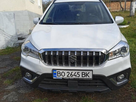 Белый Сузуки СХ4, объемом двигателя 1.59 л и пробегом 57 тыс. км за 15000 $, фото 1 на Automoto.ua