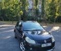 Чорний Сузукі СХ4, об'ємом двигуна 1.59 л та пробігом 267 тис. км за 5900 $, фото 1 на Automoto.ua