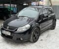 Черный Сузуки СХ4, объемом двигателя 2 л и пробегом 156 тыс. км за 5950 $, фото 1 на Automoto.ua