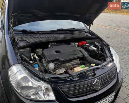 Чорний Сузукі СХ4, об'ємом двигуна 1.6 л та пробігом 315 тис. км за 5000 $, фото 39 на Automoto.ua