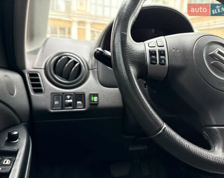 Чорний Сузукі СХ4, об'ємом двигуна 2 л та пробігом 156 тис. км за 5900 $, фото 13 на Automoto.ua