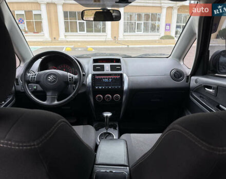 Чорний Сузукі СХ4, об'ємом двигуна 2 л та пробігом 156 тис. км за 5900 $, фото 11 на Automoto.ua