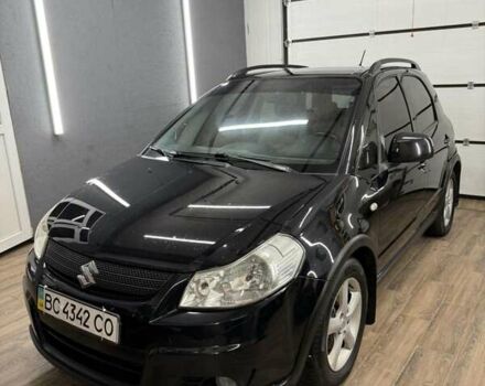 Черный Сузуки СХ4, объемом двигателя 1.6 л и пробегом 310 тыс. км за 4700 $, фото 1 на Automoto.ua