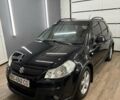 Черный Сузуки СХ4, объемом двигателя 1.6 л и пробегом 310 тыс. км за 4700 $, фото 1 на Automoto.ua