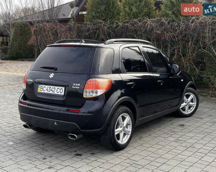 Чорний Сузукі СХ4, об'ємом двигуна 1.6 л та пробігом 315 тис. км за 5000 $, фото 7 на Automoto.ua