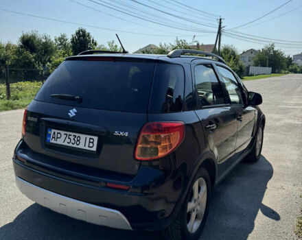 Черный Сузуки СХ4, объемом двигателя 1.6 л и пробегом 230 тыс. км за 4800 $, фото 4 на Automoto.ua
