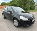 Черный Сузуки СХ4, объемом двигателя 1.5 л и пробегом 200 тыс. км за 4450 $, фото 1 на Automoto.ua