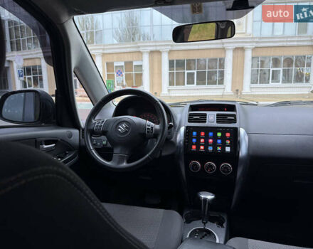 Чорний Сузукі СХ4, об'ємом двигуна 2 л та пробігом 156 тис. км за 5900 $, фото 12 на Automoto.ua