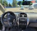 Черный Сузуки СХ4, объемом двигателя 1.6 л и пробегом 156 тыс. км за 6200 $, фото 19 на Automoto.ua