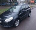 Чорний Сузукі СХ4, об'ємом двигуна 1.59 л та пробігом 285 тис. км за 5700 $, фото 4 на Automoto.ua