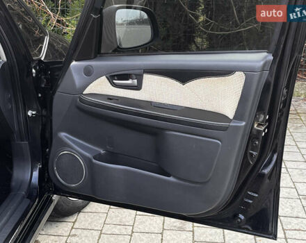 Чорний Сузукі СХ4, об'ємом двигуна 1.6 л та пробігом 315 тис. км за 5500 $, фото 18 на Automoto.ua