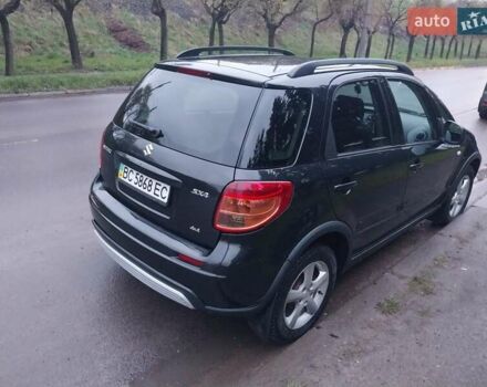 Чорний Сузукі СХ4, об'ємом двигуна 1.59 л та пробігом 285 тис. км за 5700 $, фото 2 на Automoto.ua