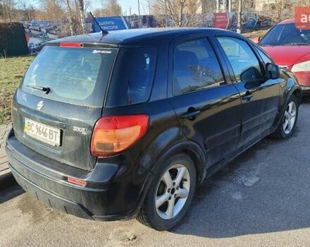 Черный Сузуки СХ4, объемом двигателя 1.6 л и пробегом 286 тыс. км за 3650 $, фото 1 на Automoto.ua