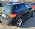 Черный Сузуки СХ4, объемом двигателя 1.6 л и пробегом 286 тыс. км за 3650 $, фото 1 на Automoto.ua