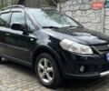 Черный Сузуки СХ4, объемом двигателя 1.6 л и пробегом 214 тыс. км за 5750 $, фото 1 на Automoto.ua