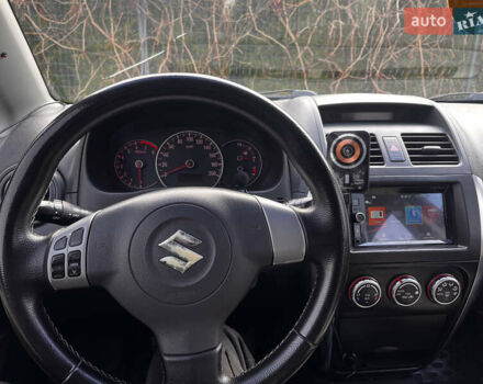 Чорний Сузукі СХ4, об'ємом двигуна 1.6 л та пробігом 315 тис. км за 5000 $, фото 23 на Automoto.ua