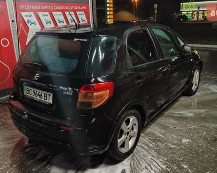 Черный Сузуки СХ4, объемом двигателя 1.6 л и пробегом 290 тыс. км за 2899 $, фото 3 на Automoto.ua