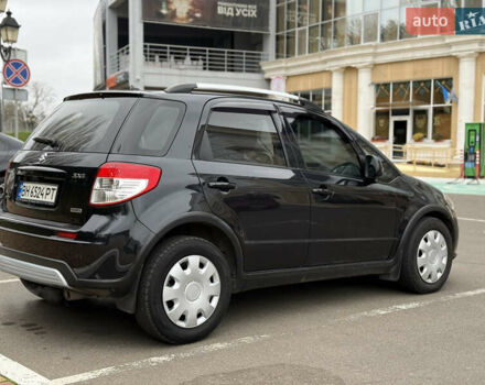 Чорний Сузукі СХ4, об'ємом двигуна 2 л та пробігом 156 тис. км за 5900 $, фото 9 на Automoto.ua