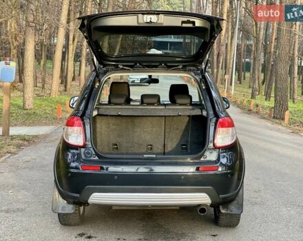 Черный Сузуки СХ4, объемом двигателя 2 л и пробегом 164 тыс. км за 7999 $, фото 5 на Automoto.ua