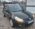 Черный Сузуки СХ4, объемом двигателя 1.91 л и пробегом 212 тыс. км за 5300 $, фото 2 на Automoto.ua