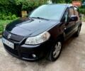 Черный Сузуки СХ4, объемом двигателя 1.6 л и пробегом 150 тыс. км за 4550 $, фото 1 на Automoto.ua
