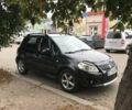 Черный Сузуки СХ4, объемом двигателя 1.59 л и пробегом 185 тыс. км за 6599 $, фото 1 на Automoto.ua
