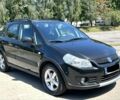 Черный Сузуки СХ4, объемом двигателя 1.6 л и пробегом 168 тыс. км за 7500 $, фото 2 на Automoto.ua