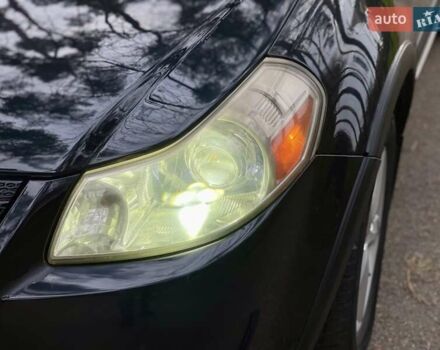 Черный Сузуки СХ4, объемом двигателя 2 л и пробегом 164 тыс. км за 7999 $, фото 3 на Automoto.ua