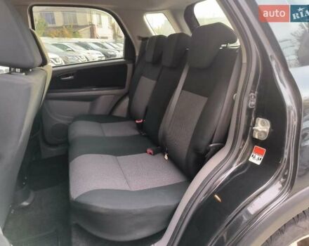 Чорний Сузукі СХ4, об'ємом двигуна 1.59 л та пробігом 137 тис. км за 7490 $, фото 9 на Automoto.ua