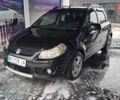 Черный Сузуки СХ4, объемом двигателя 1.6 л и пробегом 215 тыс. км за 5548 $, фото 1 на Automoto.ua