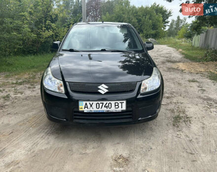 Черный Сузуки СХ4, объемом двигателя 1.59 л и пробегом 233 тыс. км за 5900 $, фото 1 на Automoto.ua