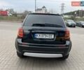 Черный Сузуки СХ4, объемом двигателя 1.59 л и пробегом 155 тыс. км за 7500 $, фото 4 на Automoto.ua