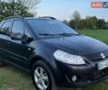 Черный Сузуки СХ4, объемом двигателя 1.6 л и пробегом 188 тыс. км за 5999 $, фото 1 на Automoto.ua