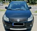 Черный Сузуки СХ4, объемом двигателя 1.6 л и пробегом 168 тыс. км за 7500 $, фото 1 на Automoto.ua