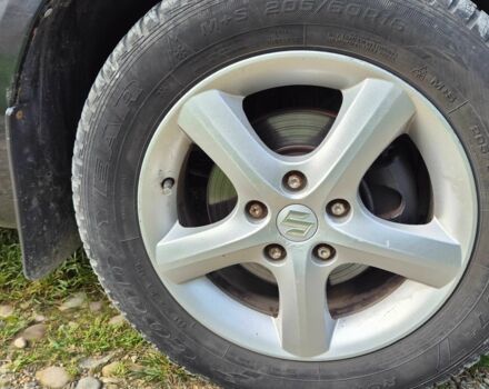 Черный Сузуки СХ4, объемом двигателя 1.6 л и пробегом 175 тыс. км за 4800 $, фото 3 на Automoto.ua