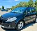 Черный Сузуки СХ4, объемом двигателя 1.6 л и пробегом 168 тыс. км за 7500 $, фото 1 на Automoto.ua