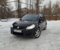 Черный Сузуки СХ4, объемом двигателя 1.6 л и пробегом 213 тыс. км за 6650 $, фото 1 на Automoto.ua