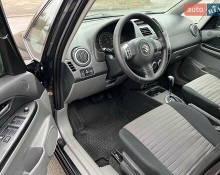 Черный Сузуки СХ4, объемом двигателя 1.59 л и пробегом 155 тыс. км за 7500 $, фото 8 на Automoto.ua