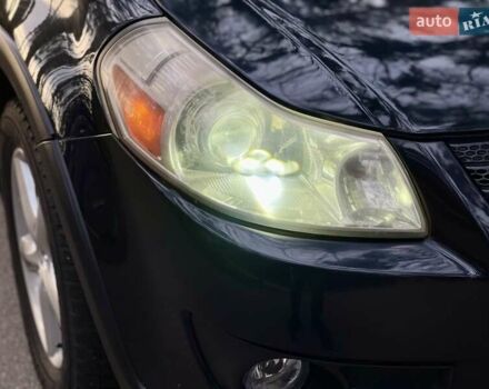 Черный Сузуки СХ4, объемом двигателя 2 л и пробегом 164 тыс. км за 7999 $, фото 2 на Automoto.ua